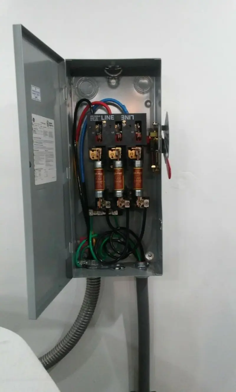 Three-phase disconnect switch installed for Smoke Detector Installation in Heartland